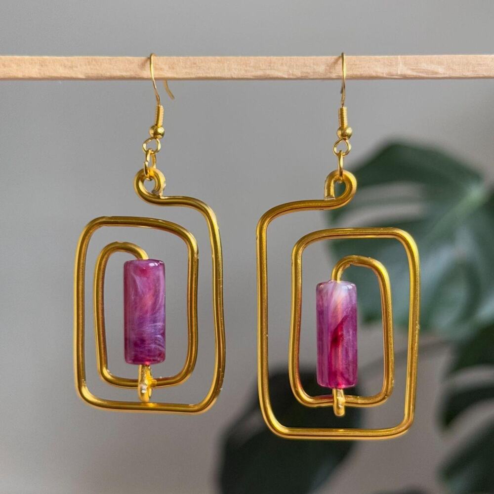 handmade gold wire spiral earrings with fuchsia pink colored tube beads